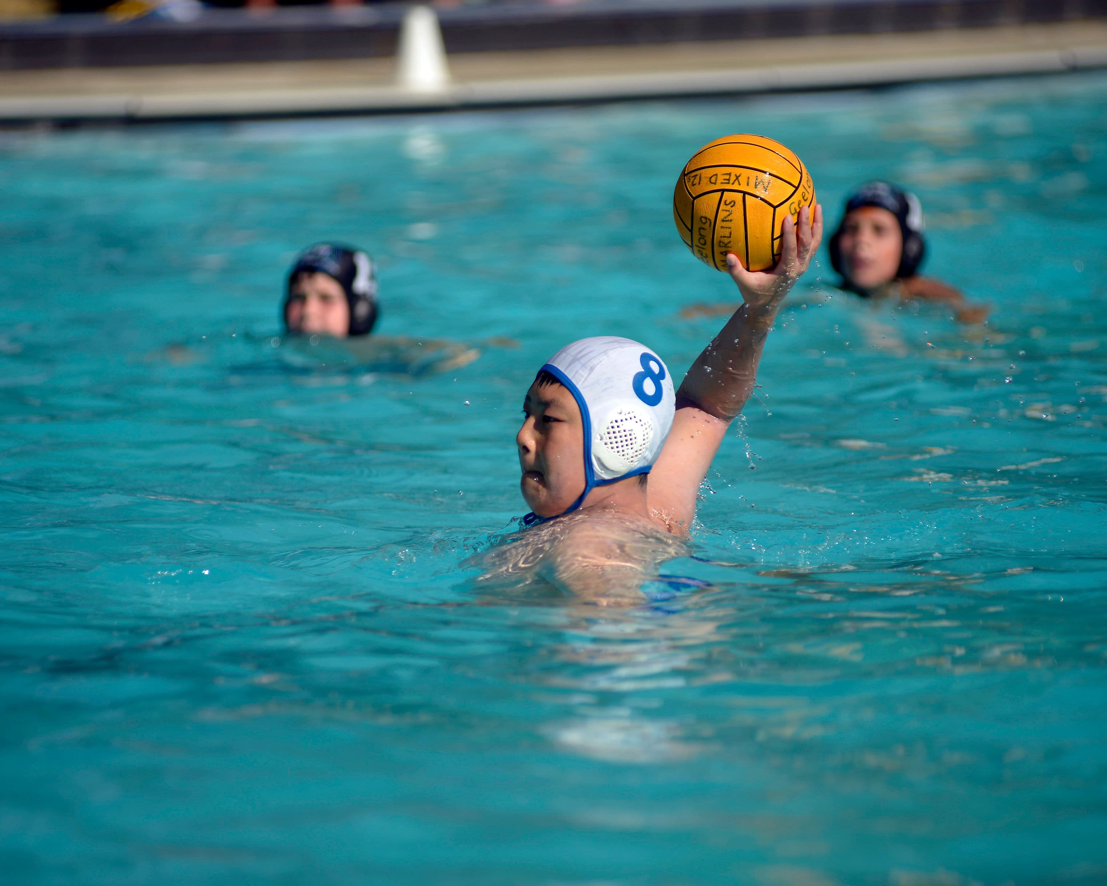 Junior player shooting at goal
