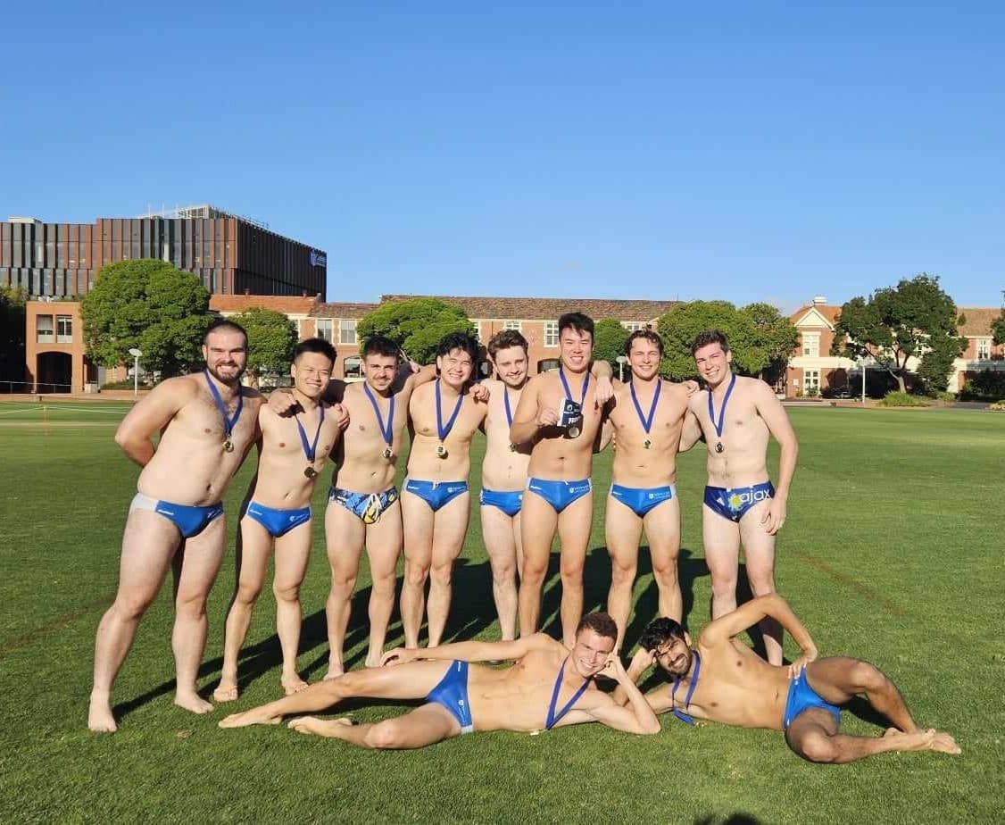 Men's team with grand final medals